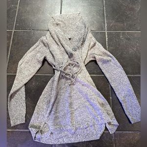 Women’s maternity sweater.